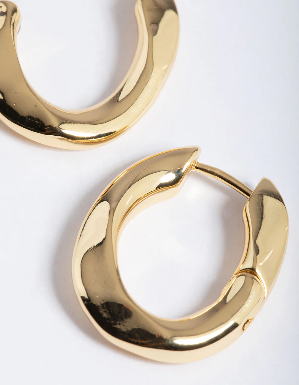 Gold Plated Brass Medium Oval Huggie Earrings - Image 4