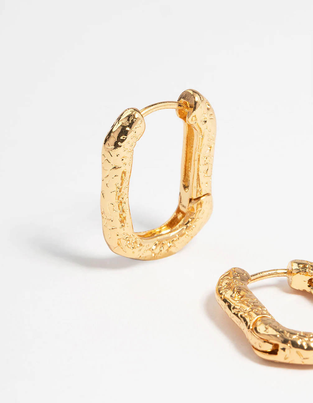 Gold Plated Brass Textured Small Huggie Earrings - Image 2