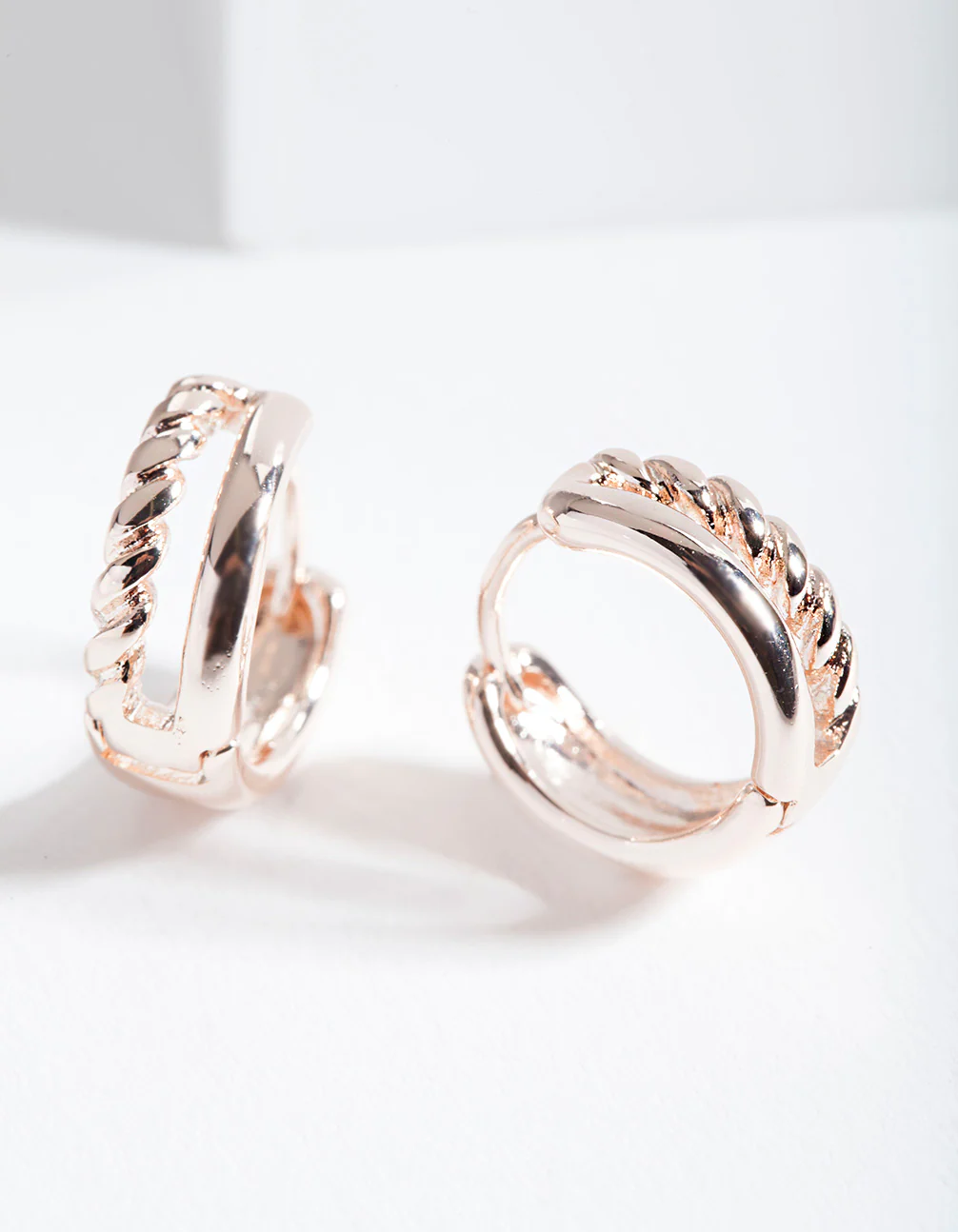 Rose Gold Twisted Huggie Hoop Earrings - Image 2