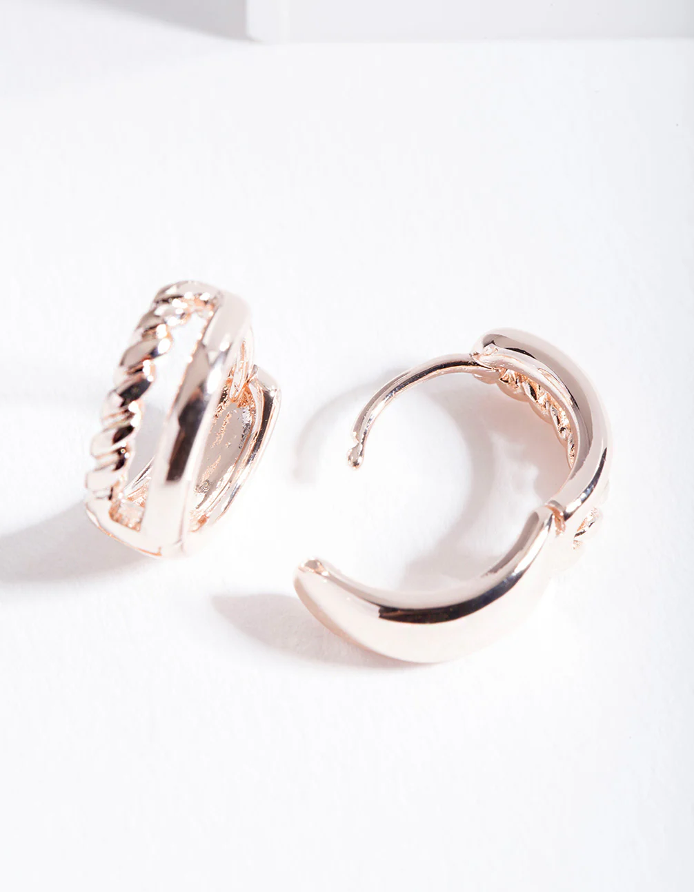 Rose Gold Twisted Huggie Hoop Earrings - Image 3