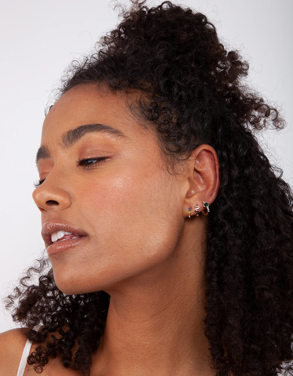 Gold Emerald Facet Huggie Earrings - Image 2