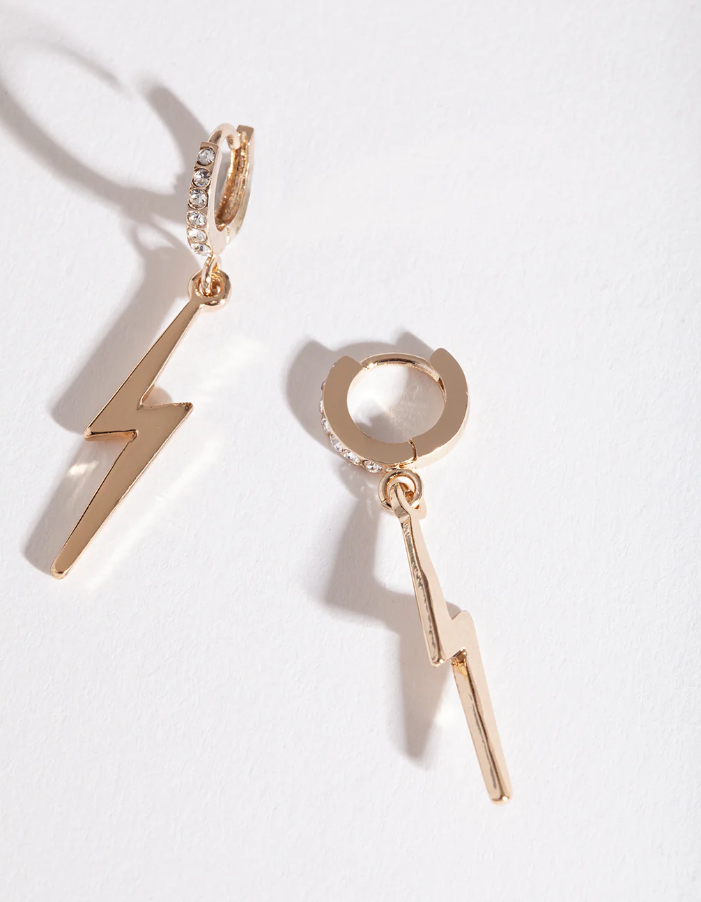 Gold Lightning Bolt Charm Huggie Earrings - Image 4