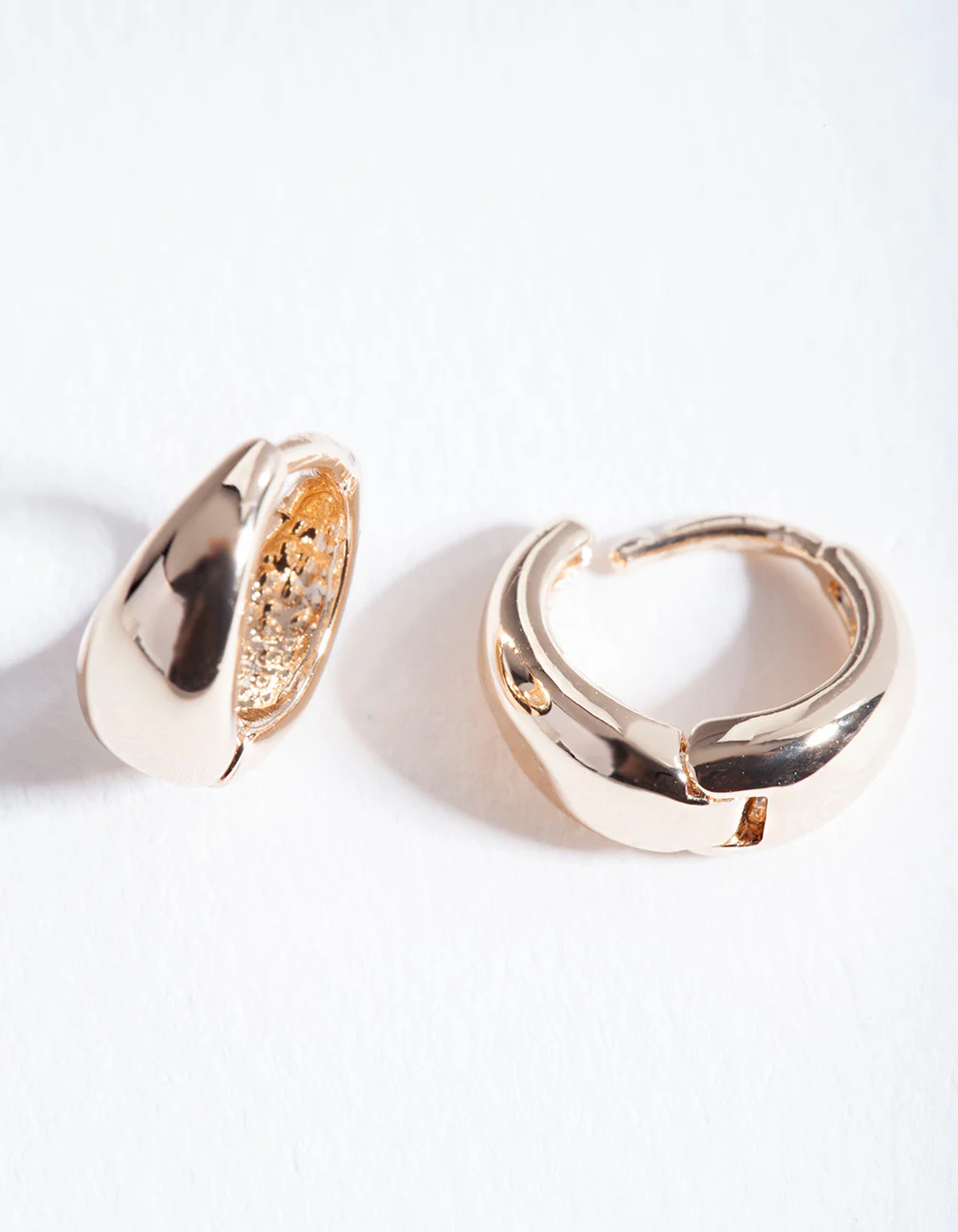 Gold Polished Chunky Huggie Earrings - Image 2