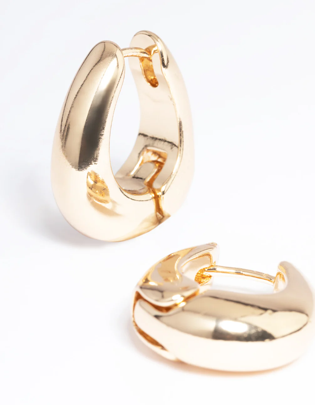 Gold Gradual Chunky Oval Huggie Earrings - Image 2