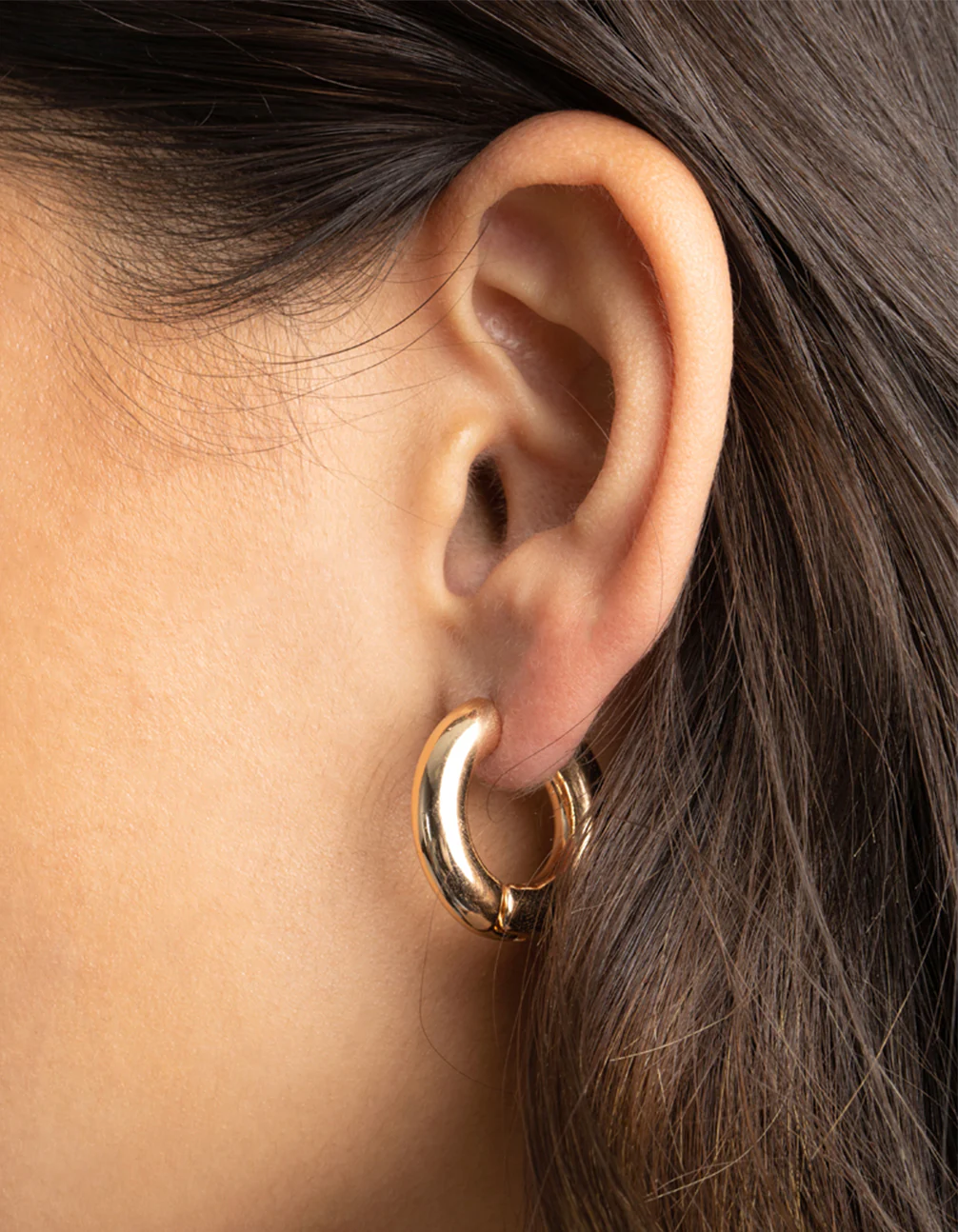 Gold Chunky Huggie Hoop Earrings - Image 2