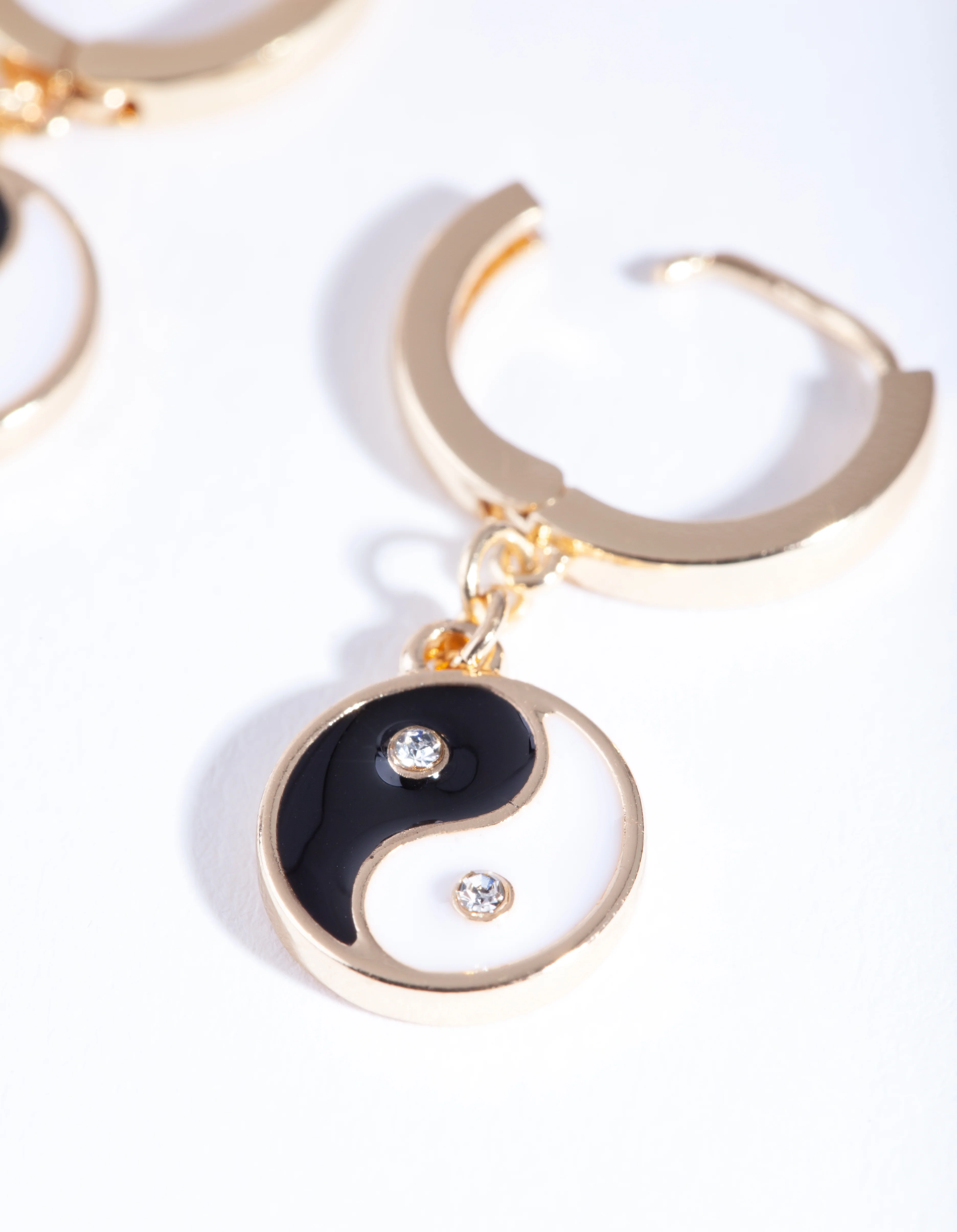 Gold Yin & Yang Huggie Earrings - Image 3