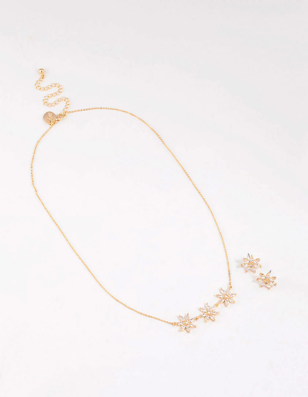 Gold Cubic Zirconia Triple Flower Necklace & Earrings Set - Image 2