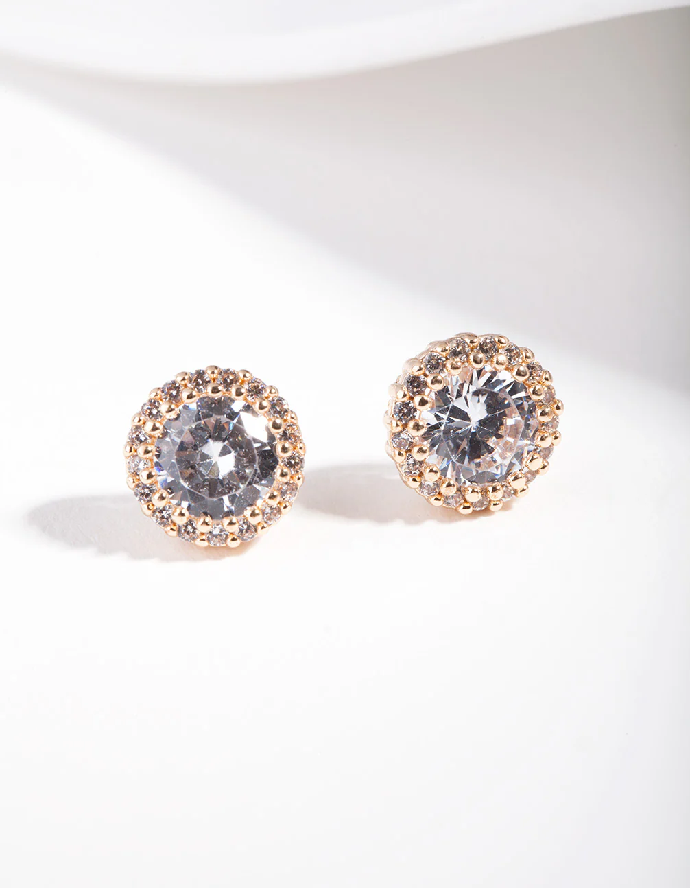 Diamond Simulant Gold Rounded Stud Earrings - Image 2