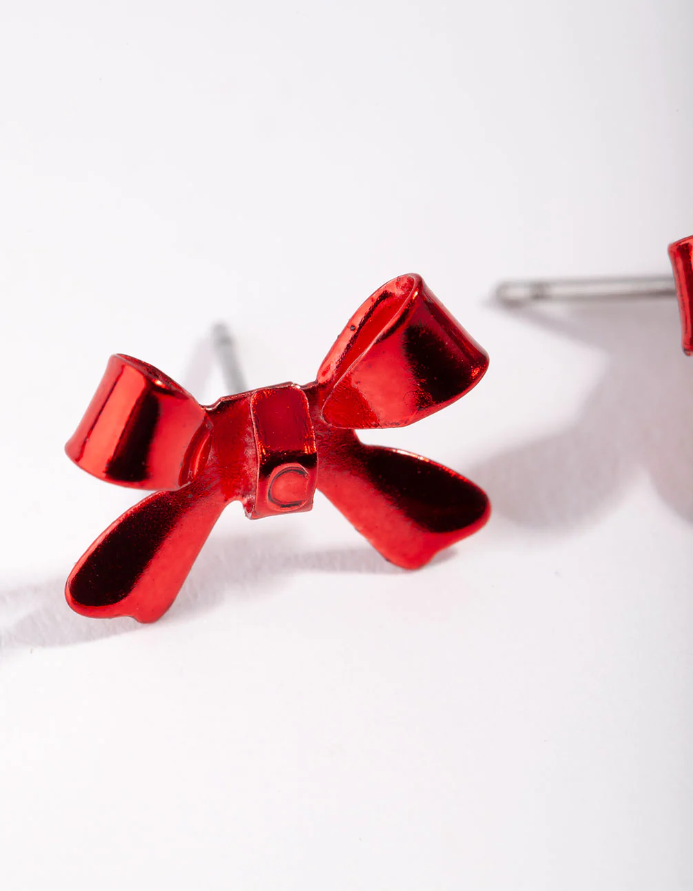 Shiny Bow Stud Earrings - Image 2
