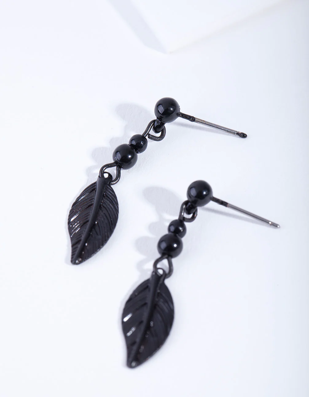 Black Metal Bead Feather Drop Earrings - Image 3