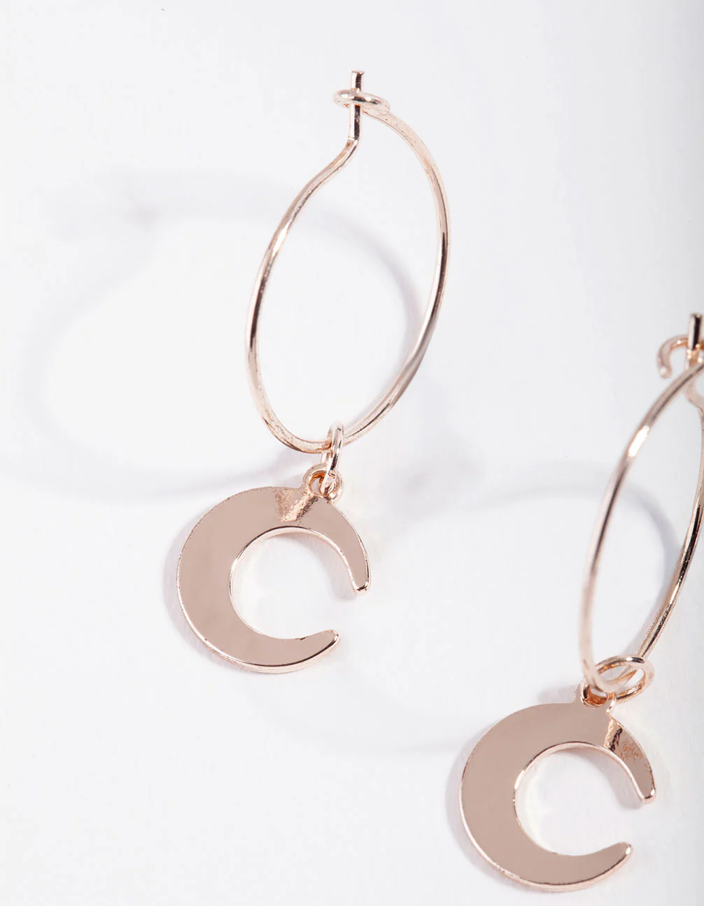 Rose Gold Mini Huggie Moon Earrings - Image 2