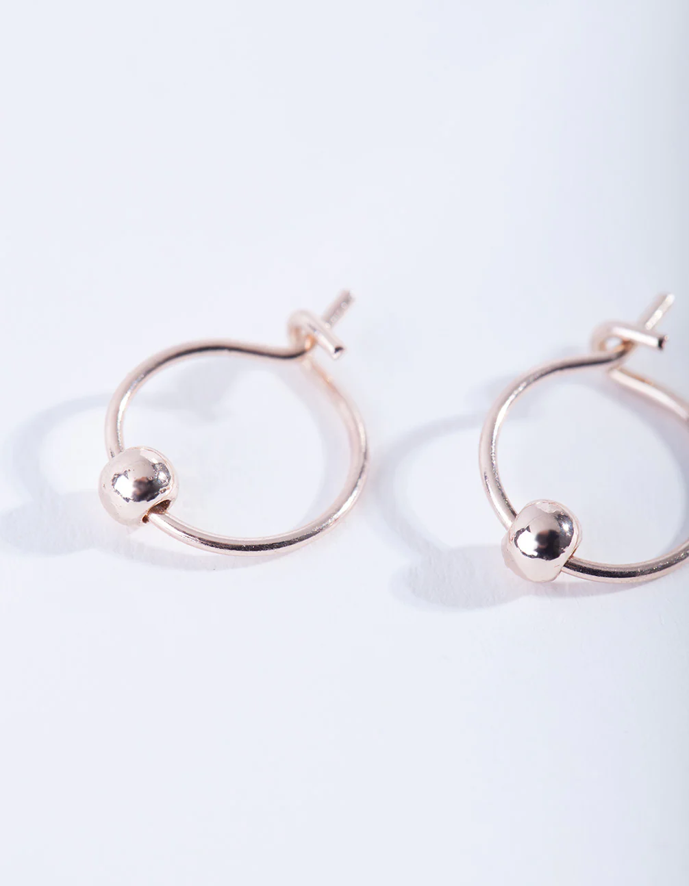 Rose Gold Mini Ball Hoop Earrings - Image 2