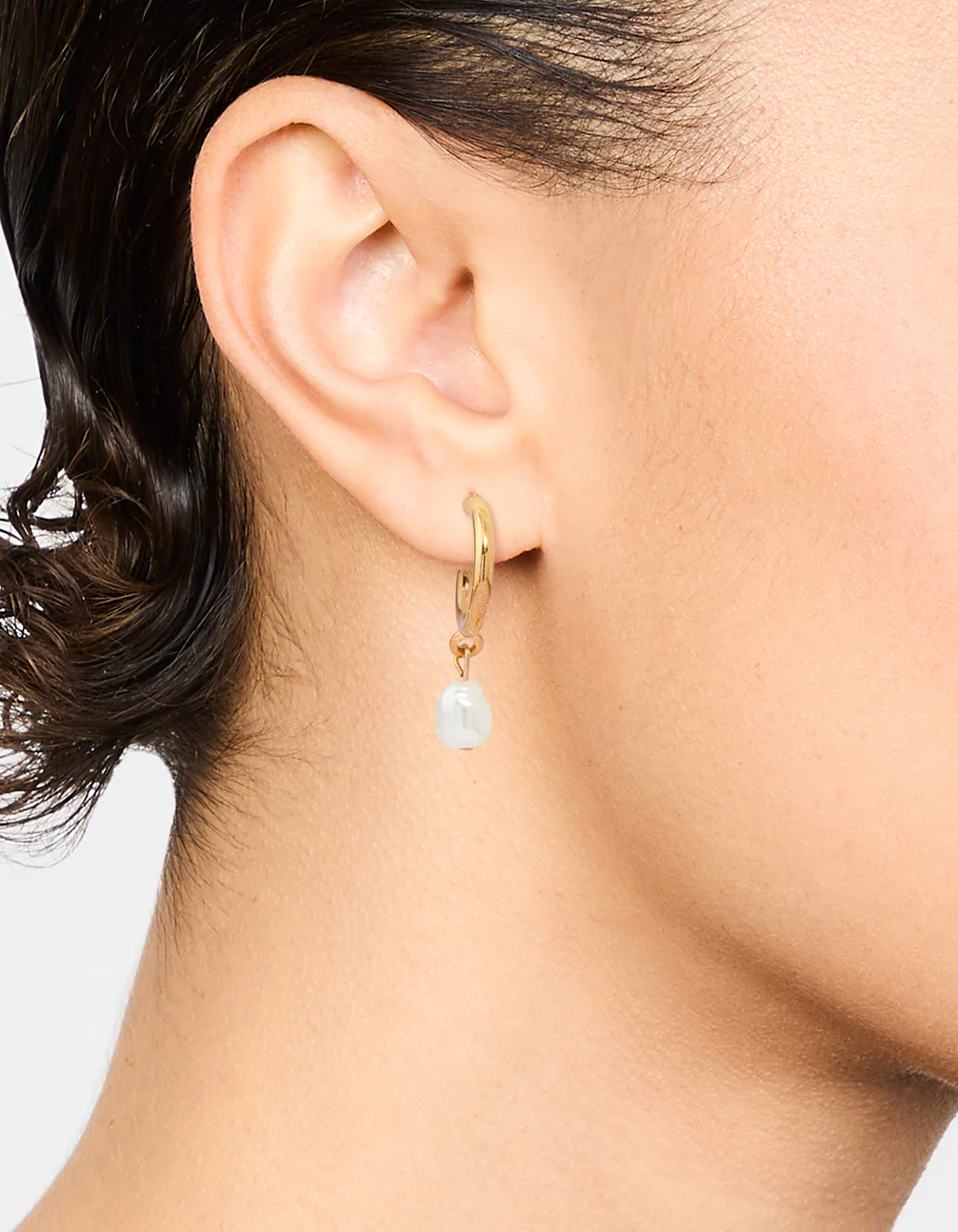 Gold Pearl Drop Huggie Earrings - Image 2