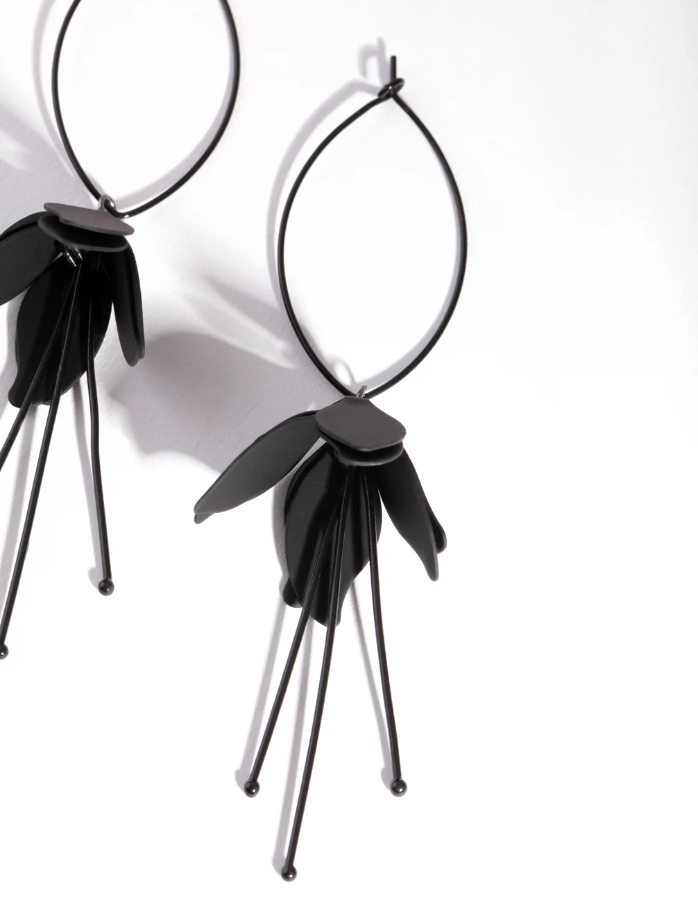 Black Coated Metal Flower Drop Earrings - Image 2