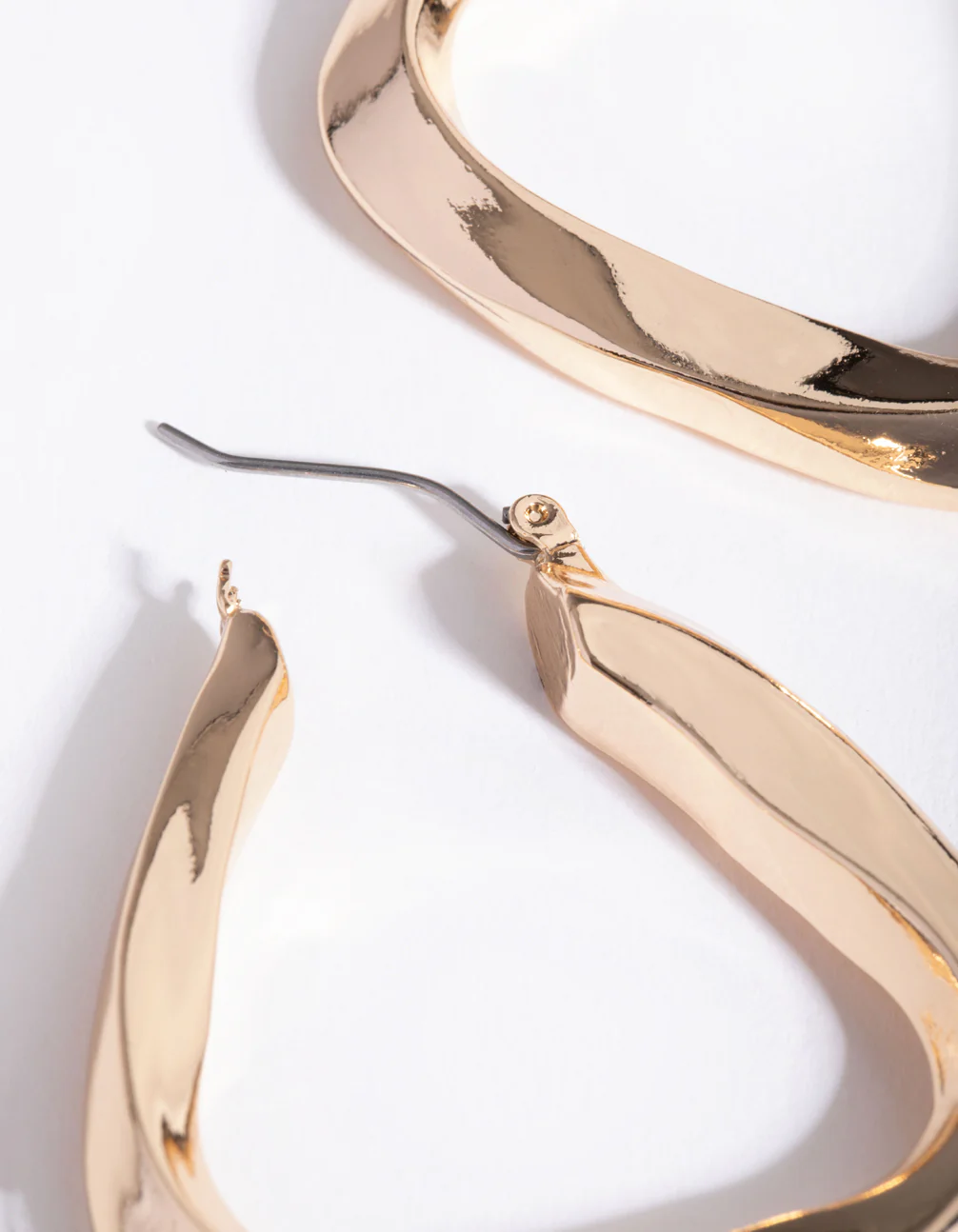 Gold Twisted Tri Hoop Earrings - Image 3