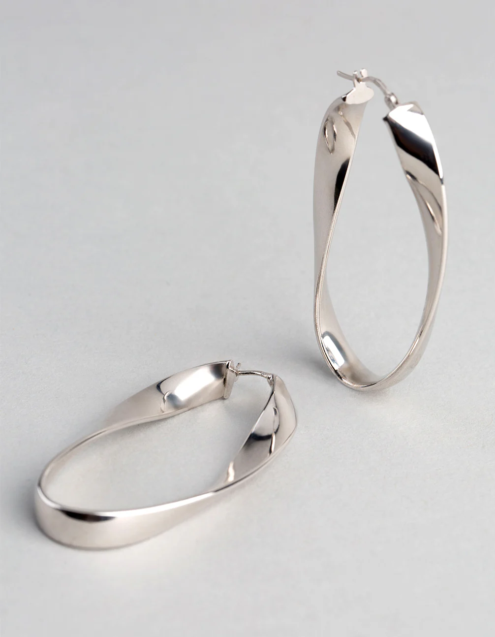 Sterling Silver Twisted Oval Hoop Earrings - Image 2