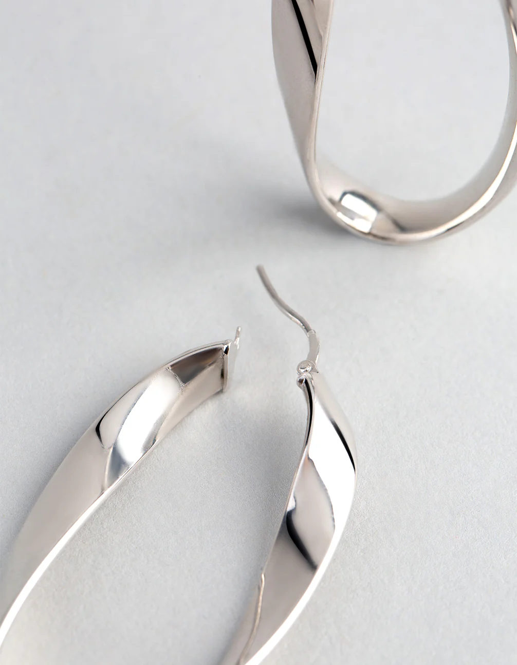 Sterling Silver Twisted Oval Hoop Earrings - Image 3