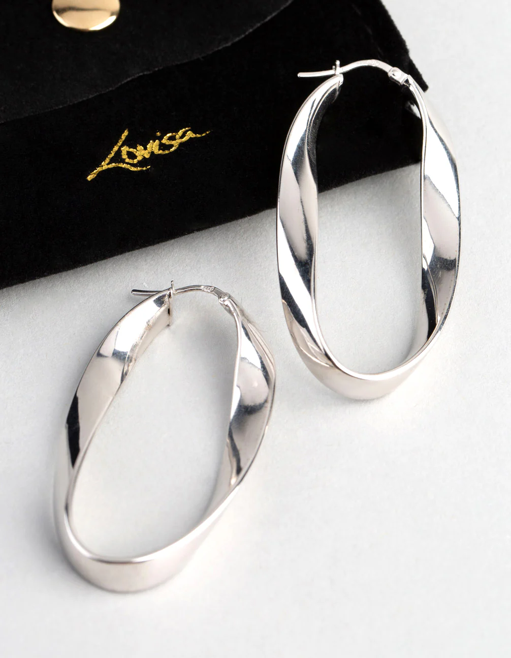 Sterling Silver Twisted Oval Hoop Earrings - Image 4