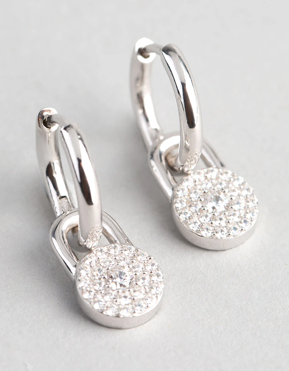 Sterling Silver Round Pave Disc Huggie Earrings - Image 2