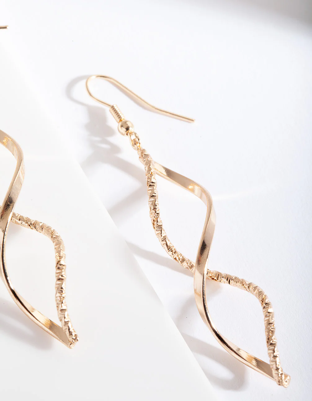Gold Textured Twist Earrings - Image 2