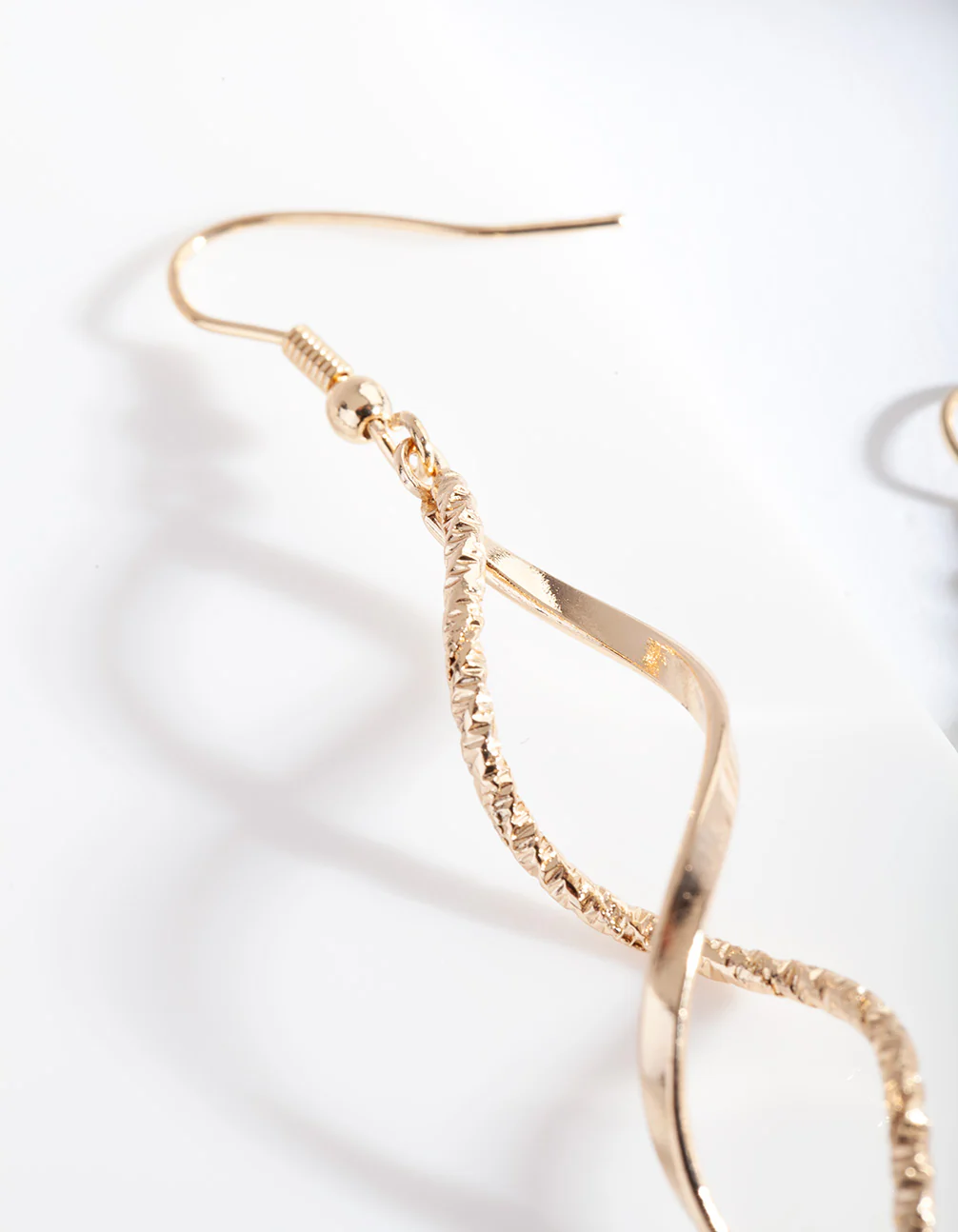 Gold Textured Twist Earrings - Image 3