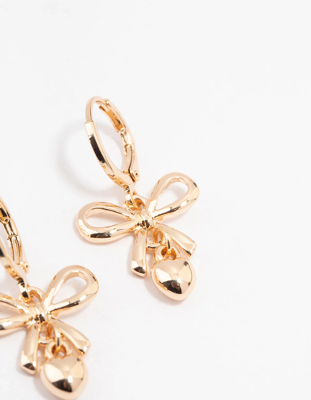 Gold Bow & Heart Drop Huggie Earrings - Image 3