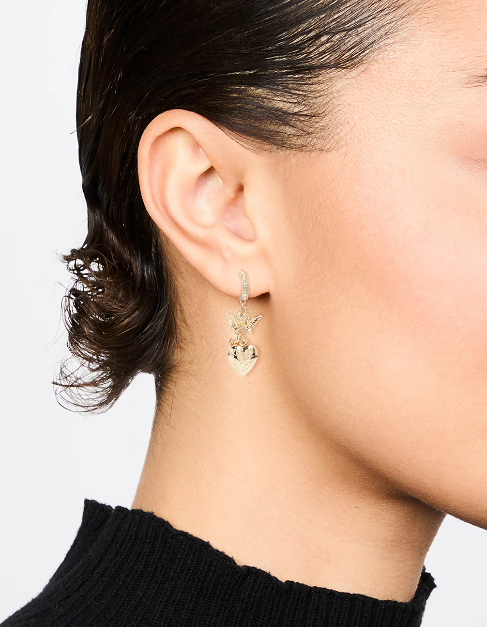 Gold Cherub Heart Cross Huggie Earrings - Image 2