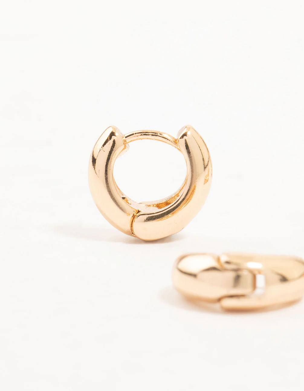 Gold Cubic Zirconia Oval Huggie Earrings 3-Pack - Image 2