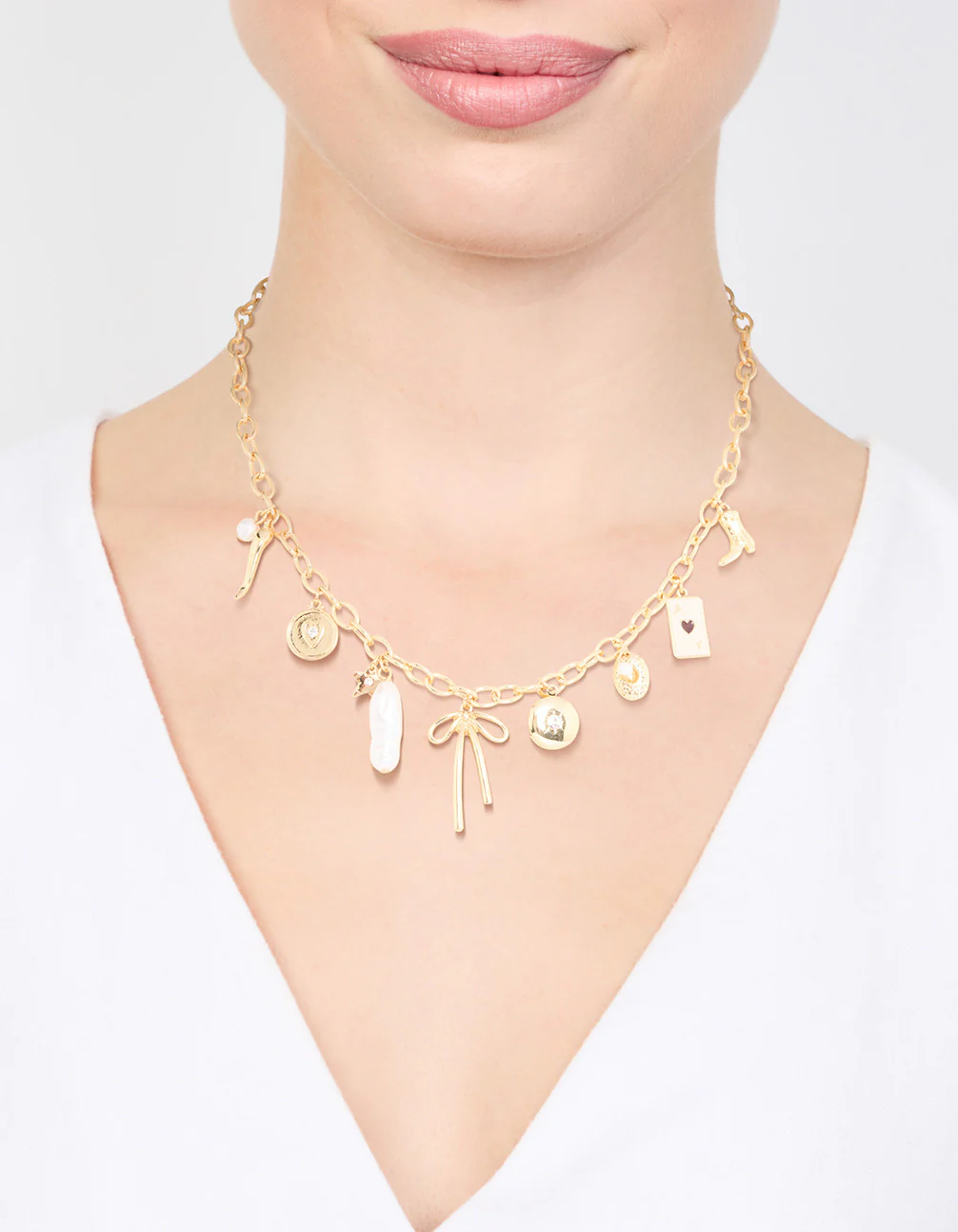 Gold Plated Bow & Star Charm Necklace - Image 3