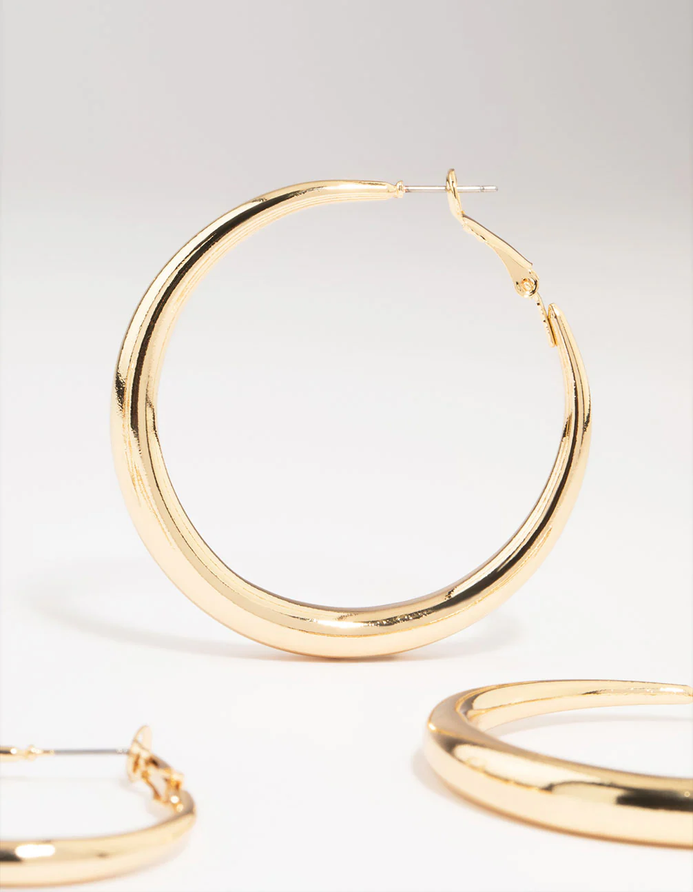 Gold Smooth Huggie Hoop Earrings 3-Pack - Image 3