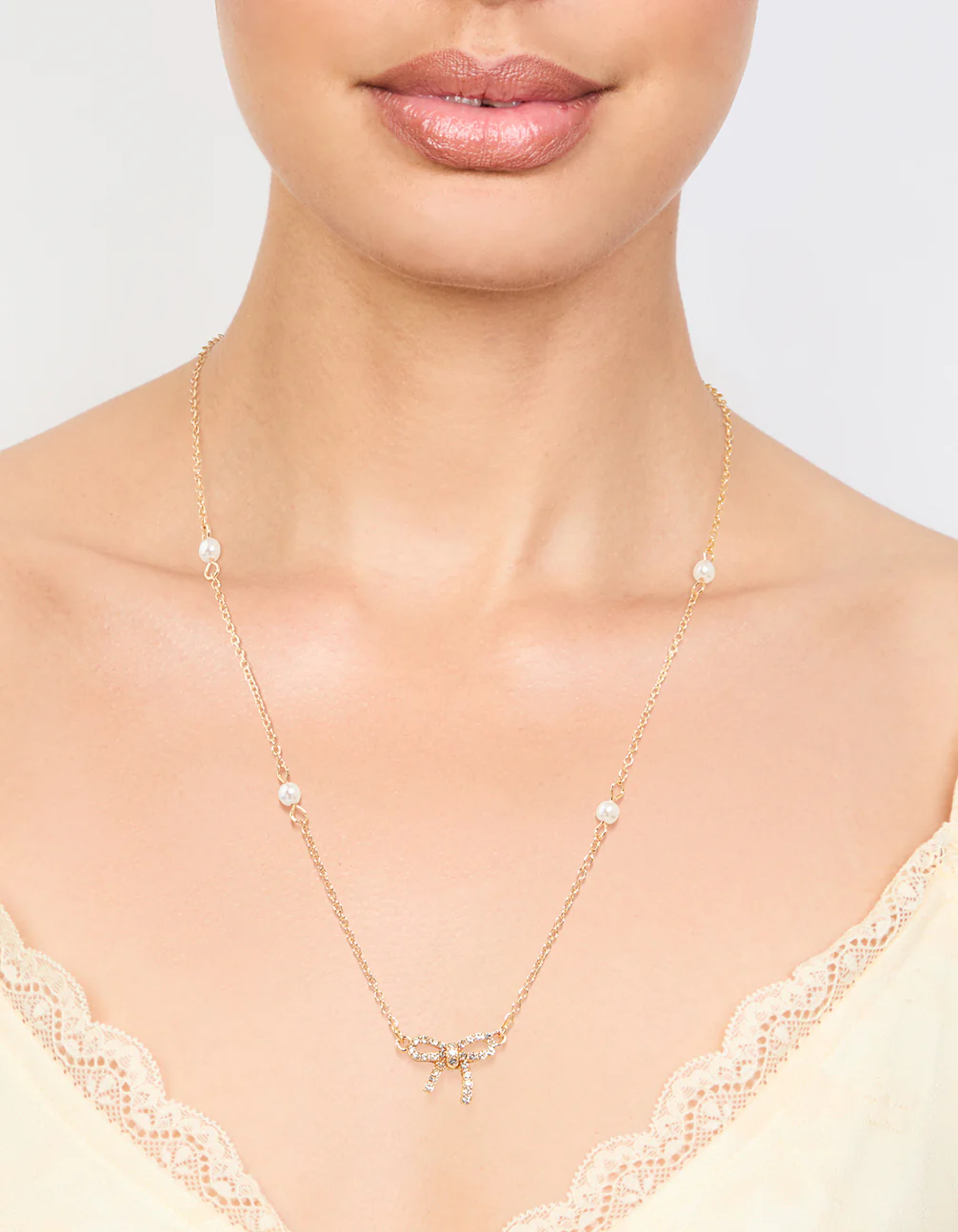 Gold Plated Station Pearl Diamante Bow Pendant Necklace - Image 2