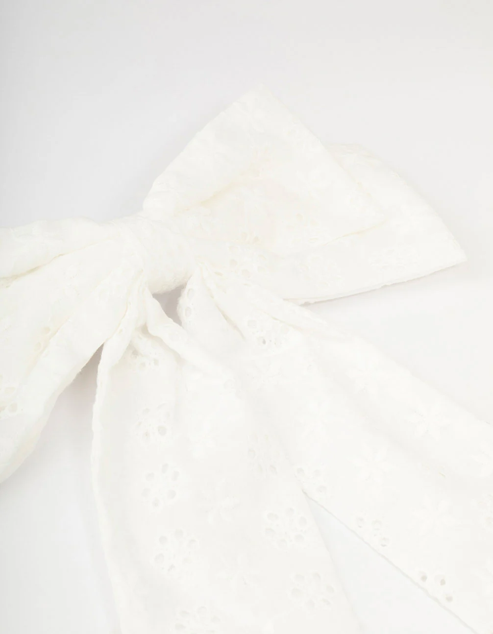 Large White Fabric Broderie Bow Clip - Image 2