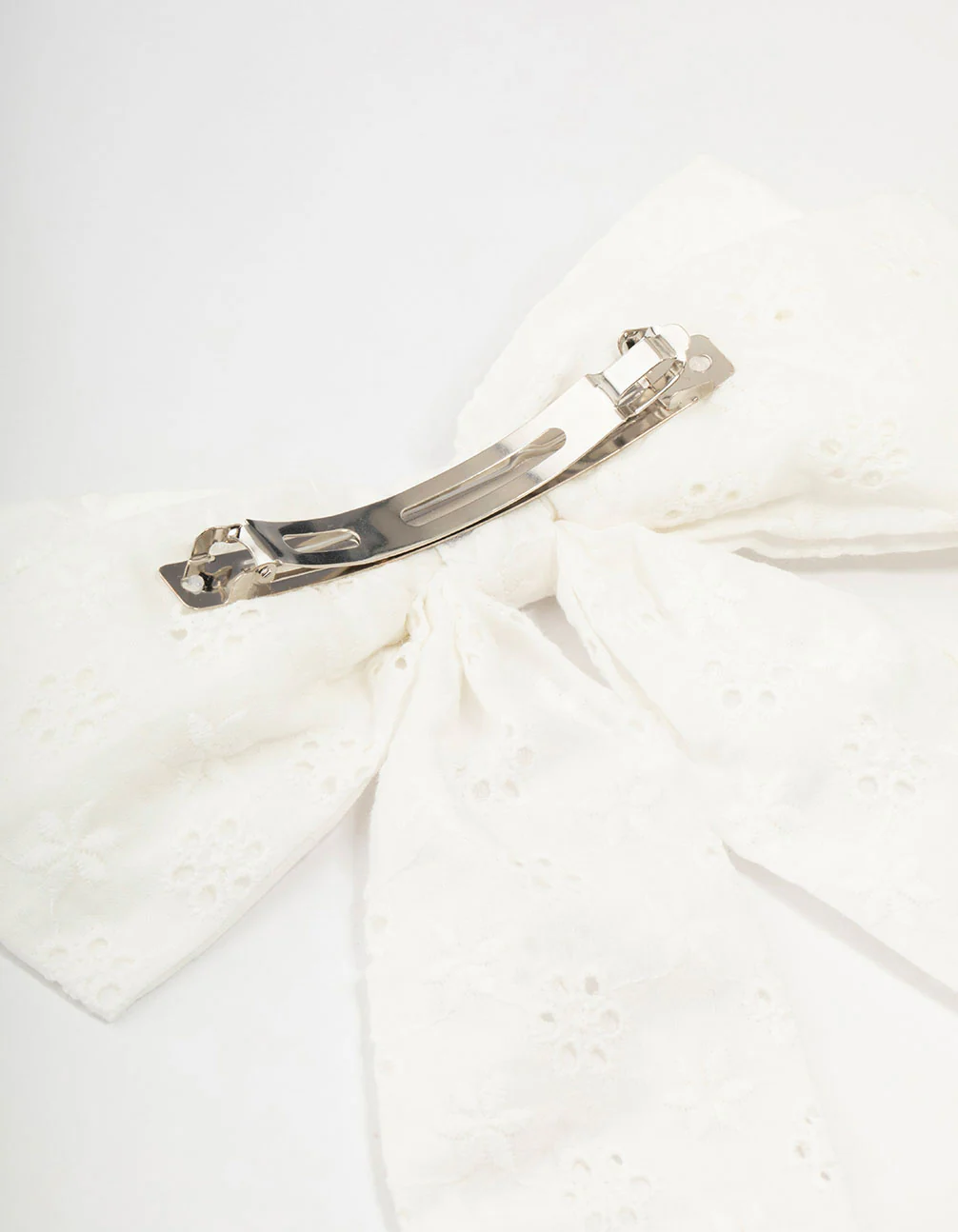 Large White Fabric Broderie Bow Clip - Image 3