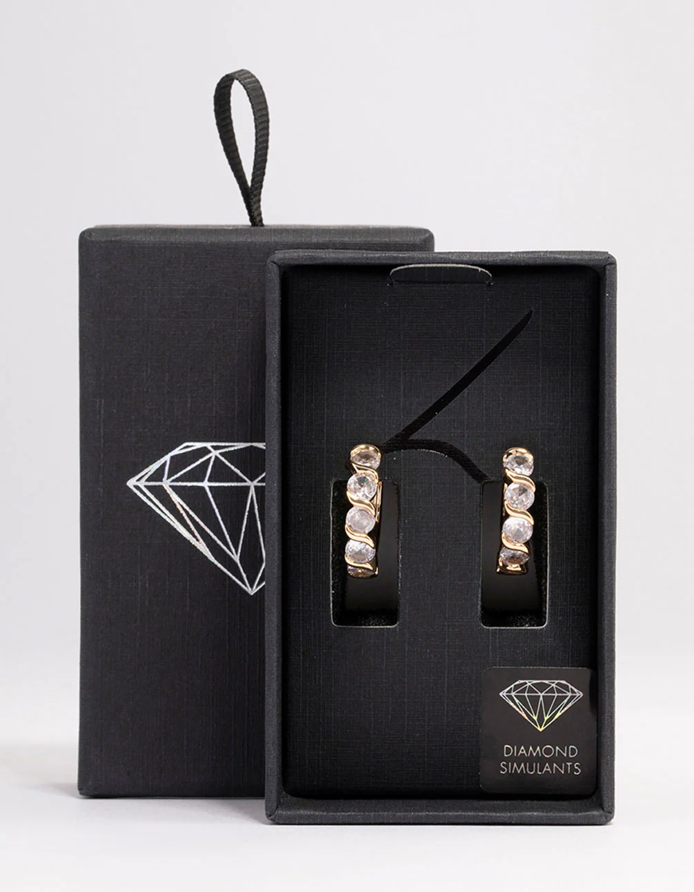 Gold Round Cubic Zirconia Huggie Earrings - Image 3