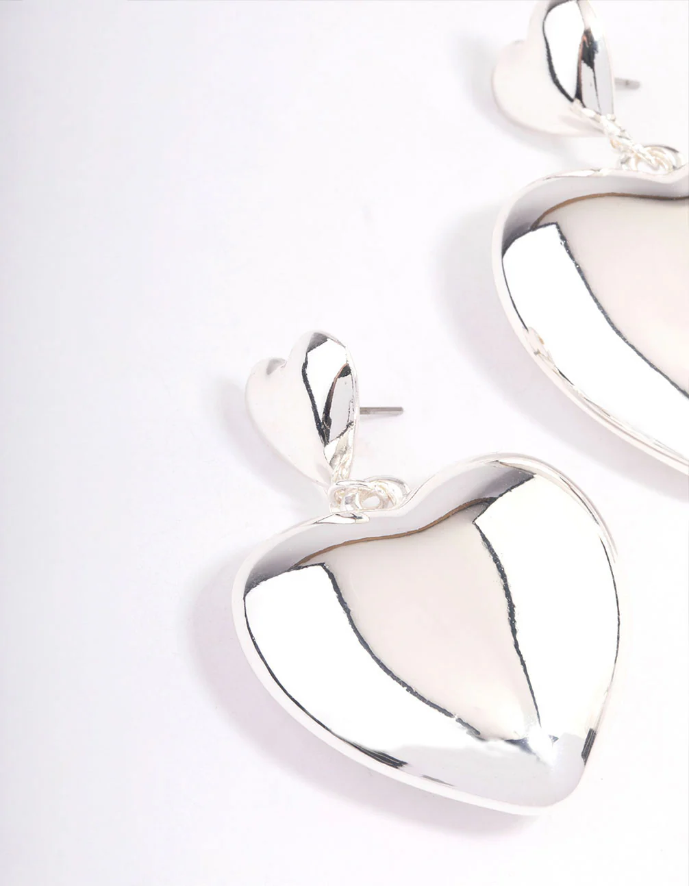Silver Puffy Heart Statement Earrings - Image 2