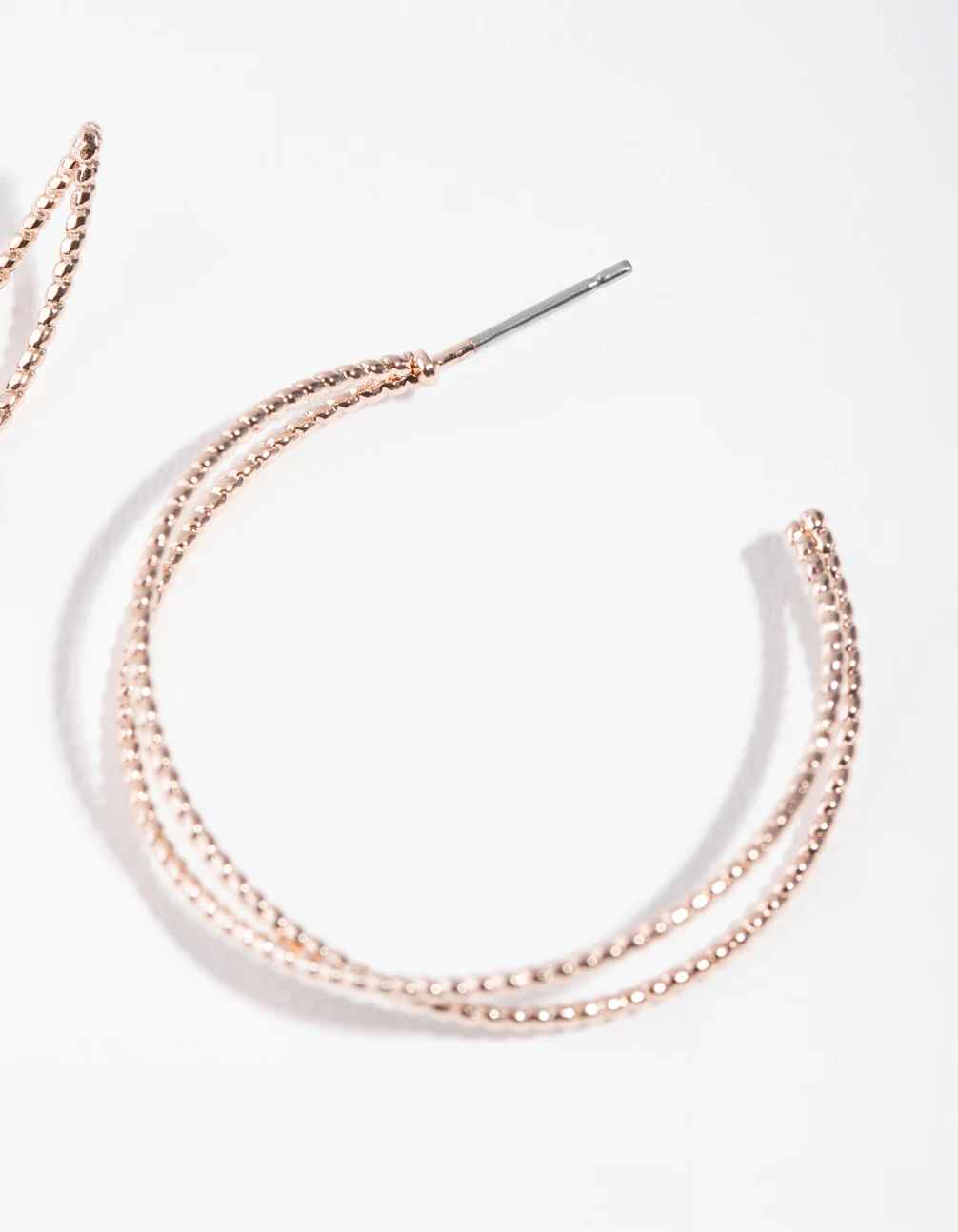Rose Gold Crossover Hoop Earrings - Image 2