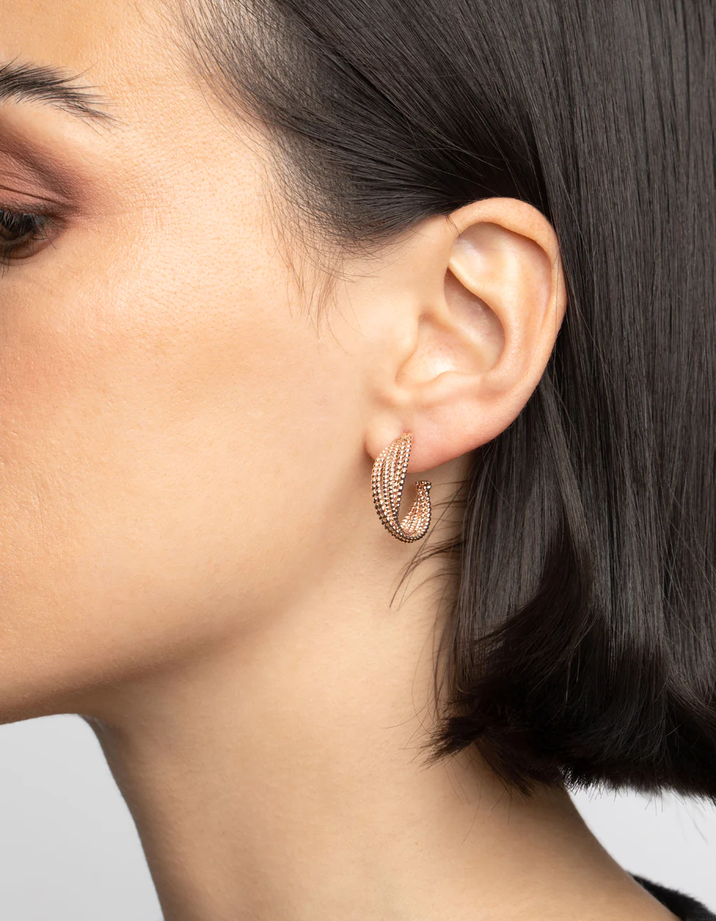 Rose Gold Criss Cross Hoop Earrings - Image 5