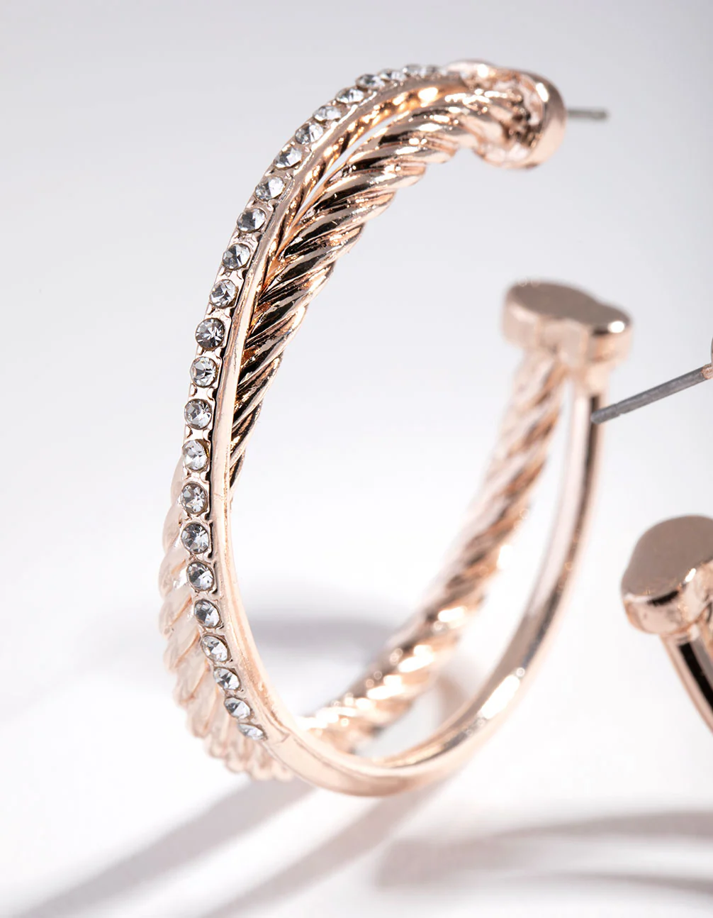 Rose Gold Double Cross Over Hoop Earrings - Image 2