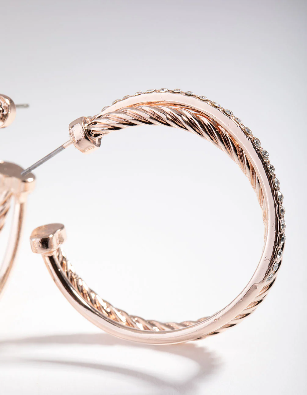 Rose Gold Double Cross Over Hoop Earrings - Image 3