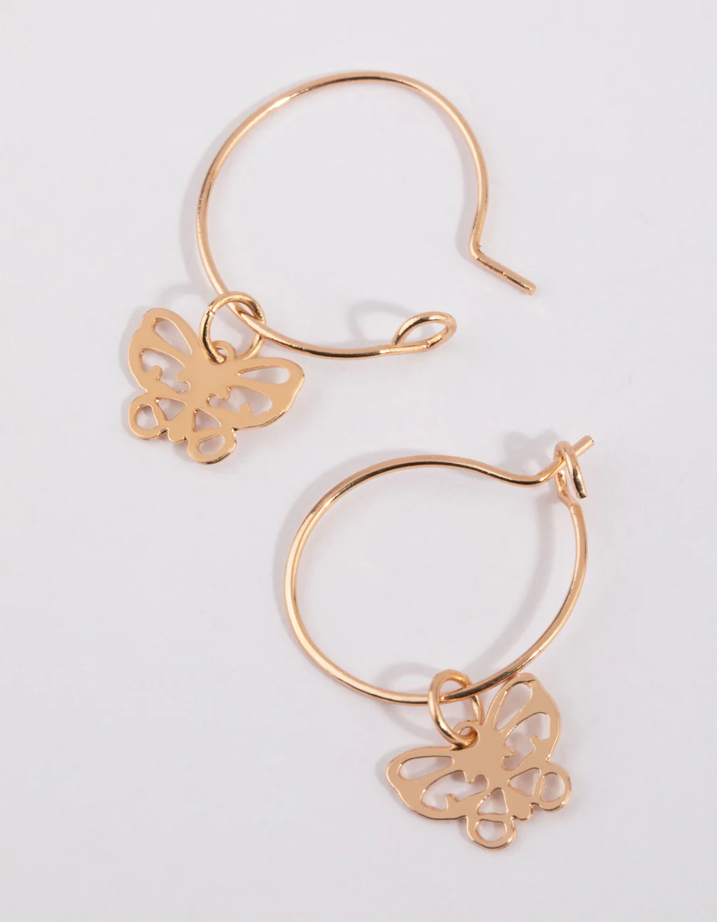 Gold Cut Out Butterfly Huggie Earrings - Image 2