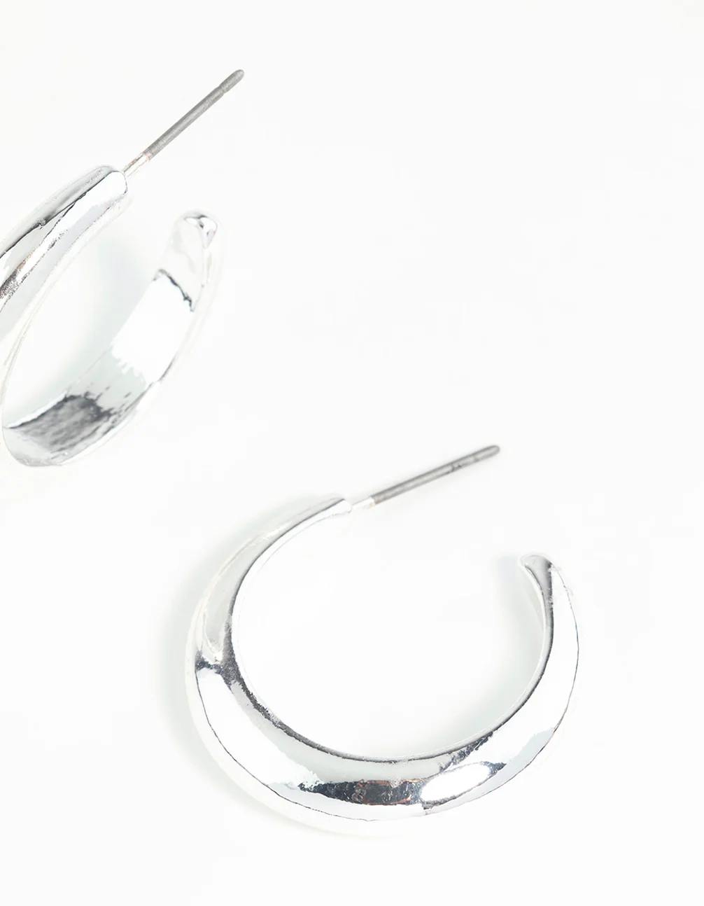Silver Rounded Hollow Huggie Earrings - Image 3