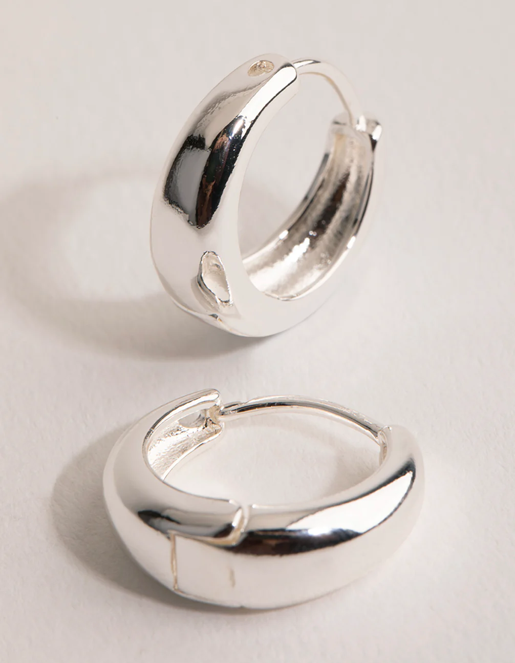 Silver Plain Chubby Huggie Earrings - Image 3