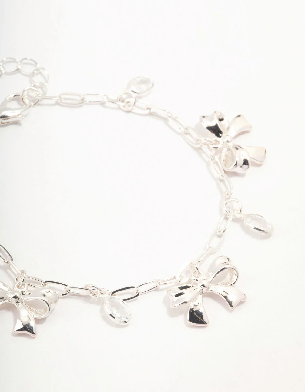 Silver Plated Alternating Cubic Zirconia & Bow Charm Bracelet - Image 2