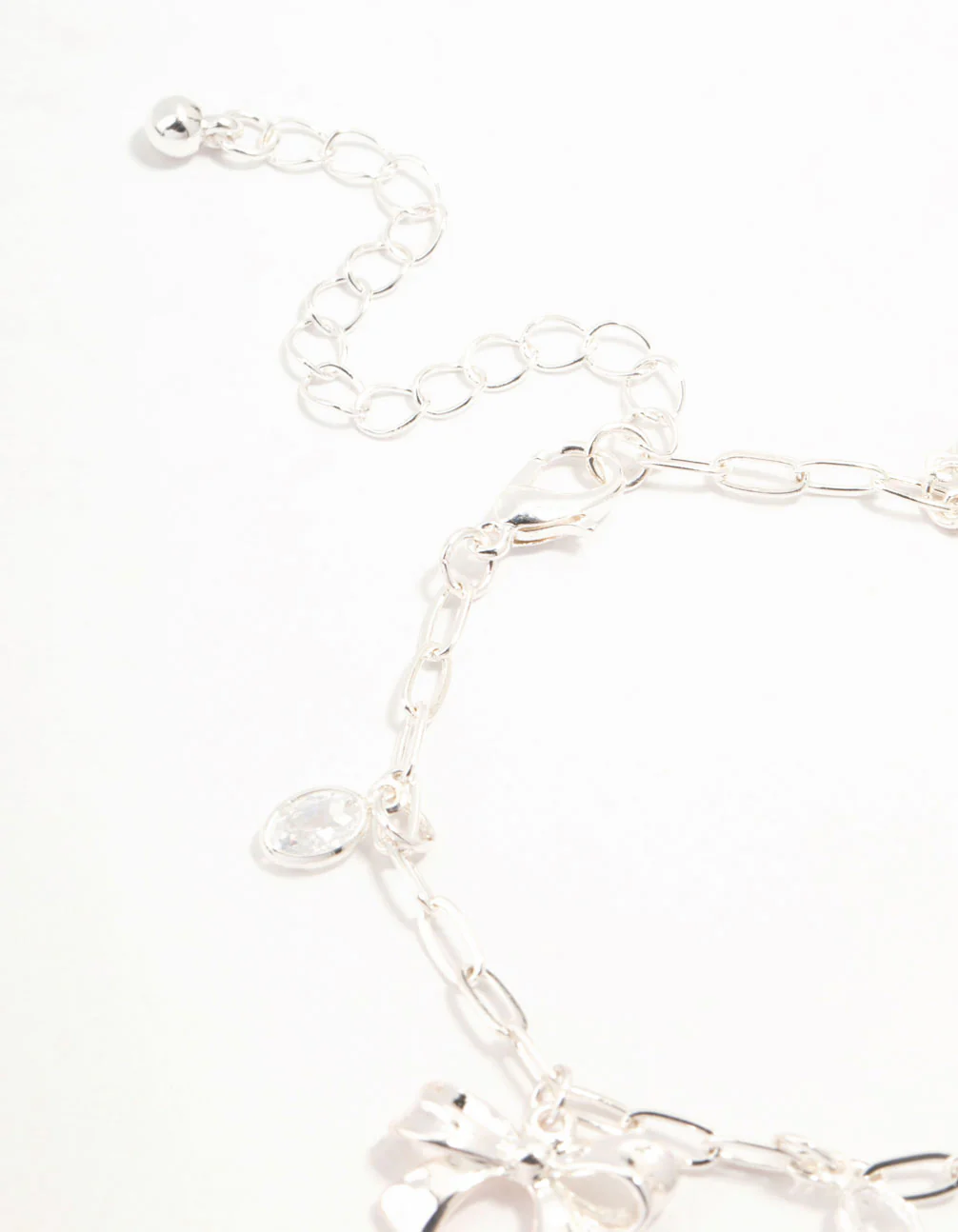 Silver Plated Alternating Cubic Zirconia & Bow Charm Bracelet - Image 3