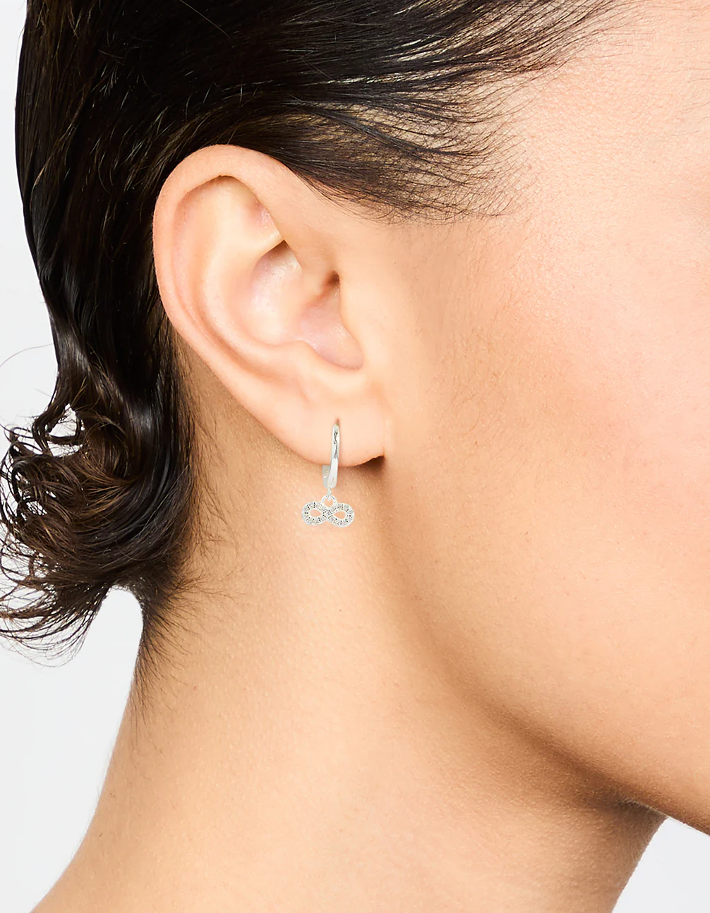 Sterling Silver Cubic Zirconia Infinity Huggie Earrings - Image 2