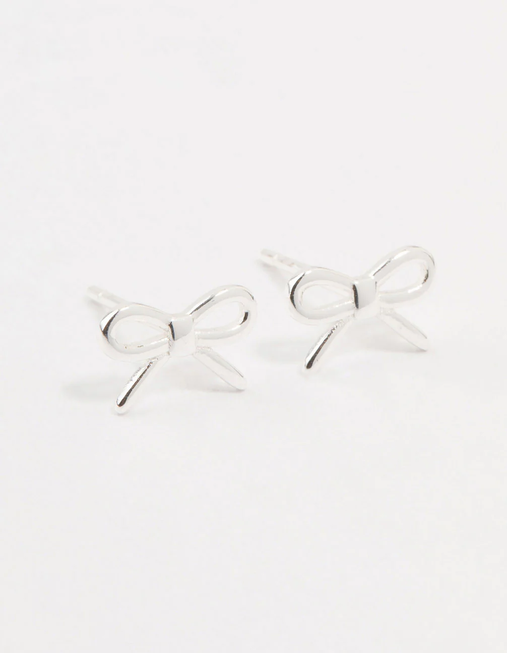 Sterling Silver Cut Out Bow Stud Earrings - Image 2