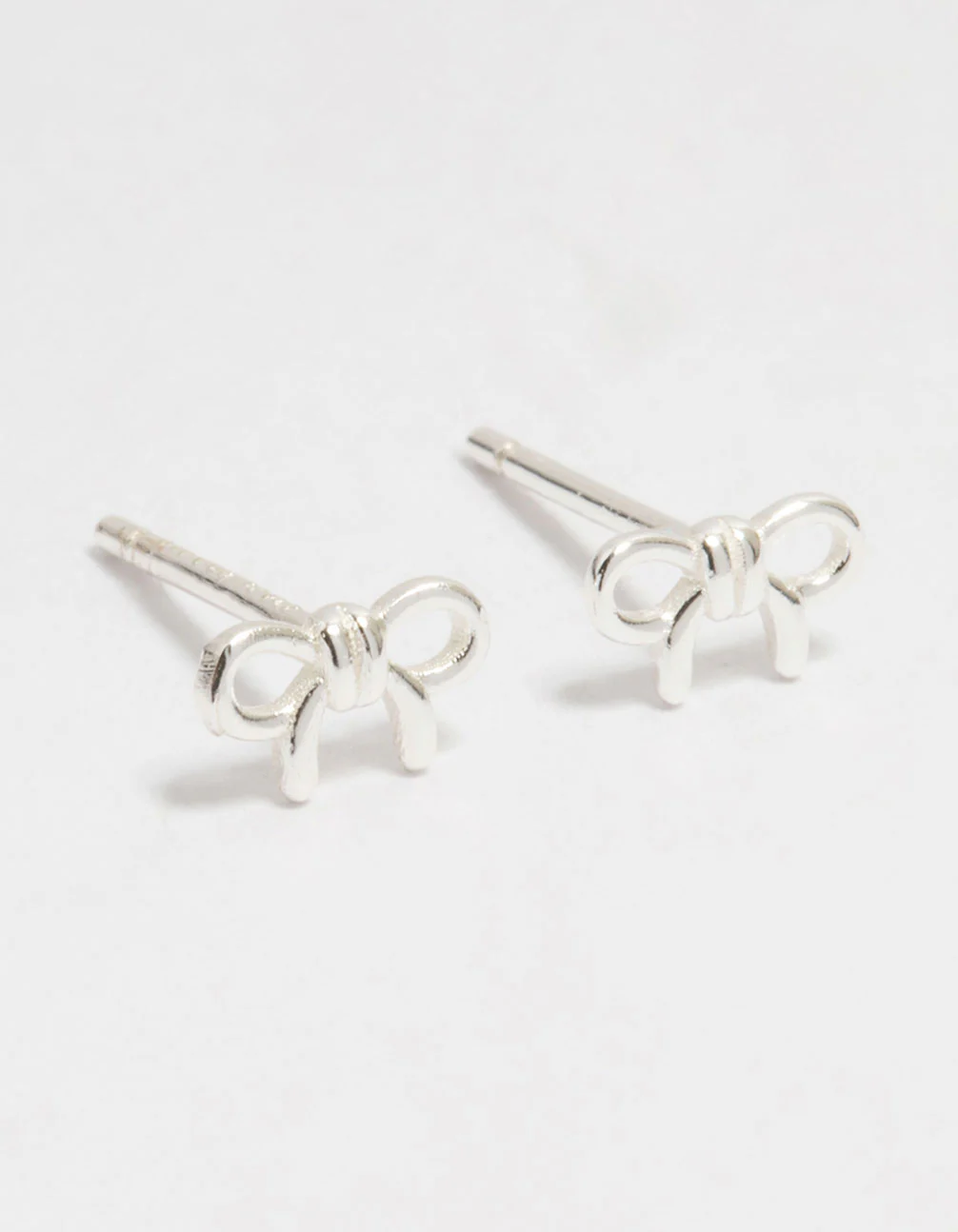 Sterling Silver Mini Clean Bow Stud Earrings