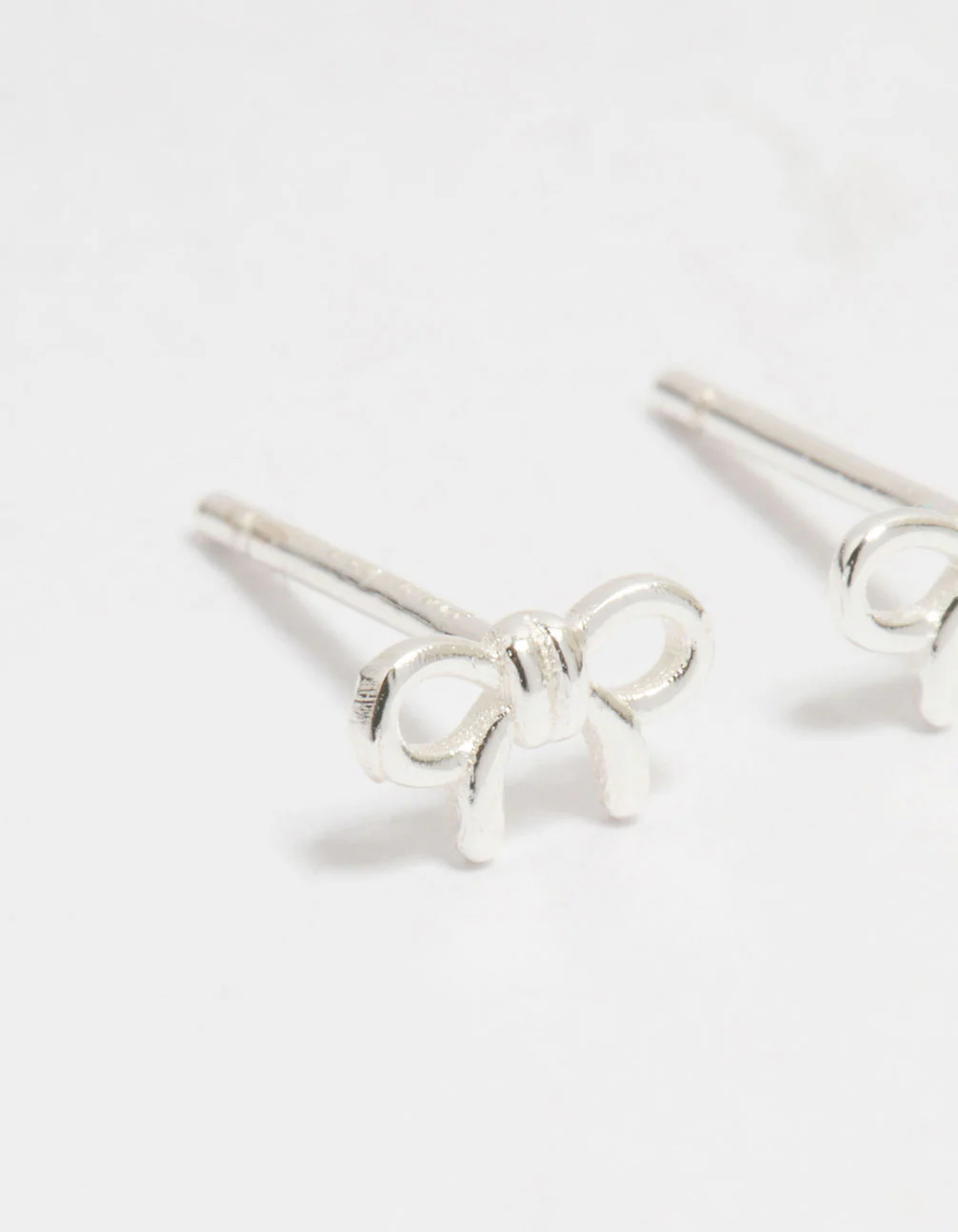 Sterling Silver Mini Clean Bow Stud Earrings - Image 4