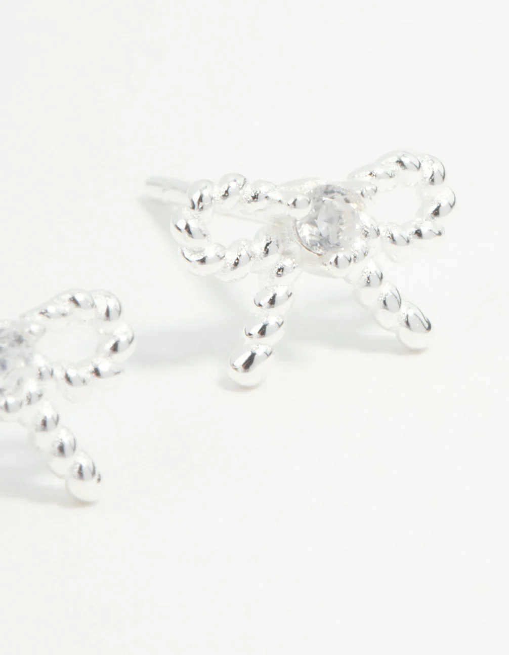 Sterling Silver Textured Bow Stud Earrings - Image 2