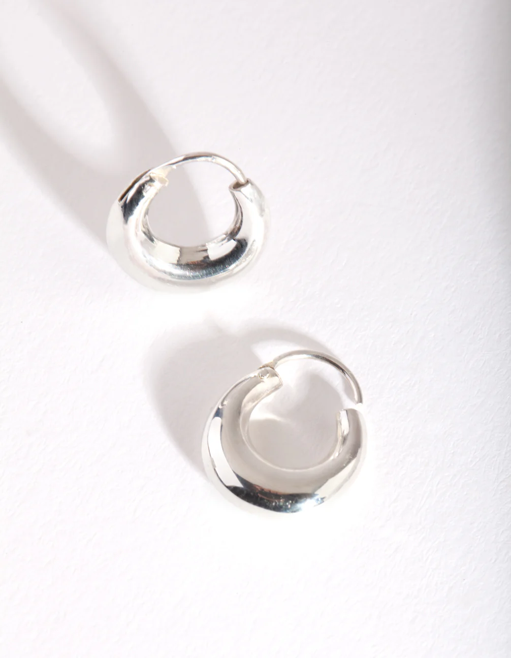 Silver Mini Chubby Huggie Earrings - Image 2